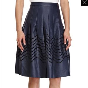 Beautiful Halston Heritage faux-leather navy skirt with embroidered eyelets.